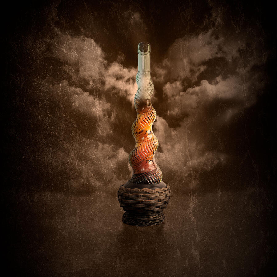 A vertical light painting of a twisted glass wine bottle in a woven basket base with glowing amber liquid inside.